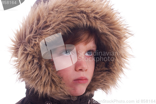 Image of Cute boy with a furry hood