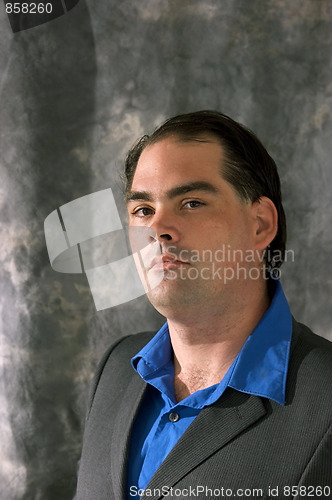 Image of serious man in suit