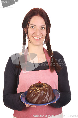 Image of housewife showing off bundt cake 