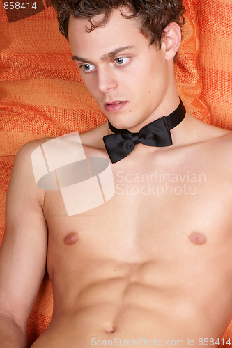 Image of Sexy young man with bow tie