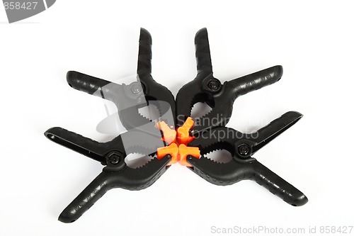 Image of plastic clamps composition on white background