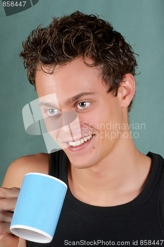 Image of Young man with mug