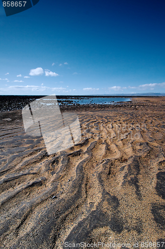 Image of Black and sand beach