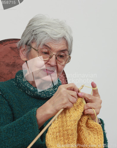 Image of Old woman knitting