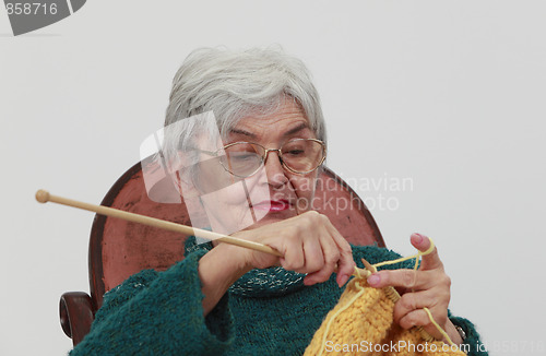 Image of Old woman knitting
