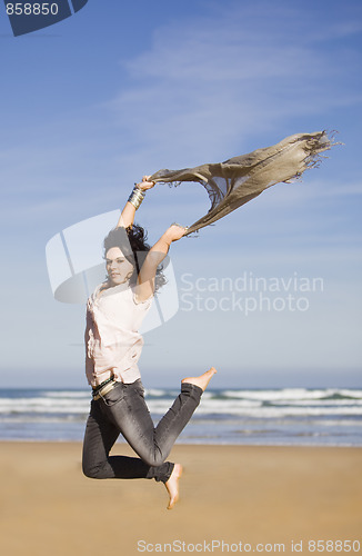 Image of pretty happy girl jumping