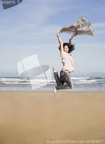 Image of pretty happy girl jumping