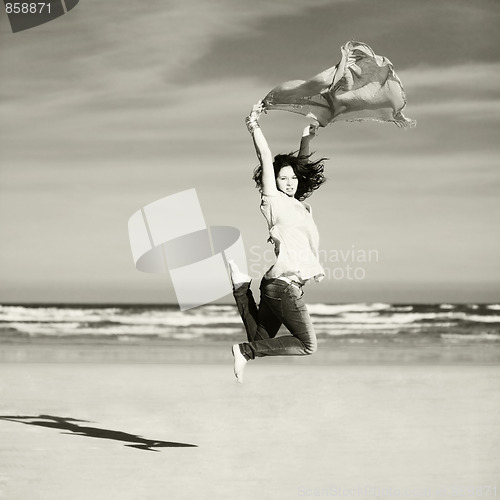 Image of pretty happy girl jumping