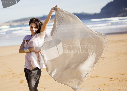Image of young pretty girl beach