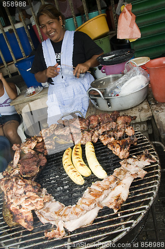 Image of editorial street food vendor cooking leon nicaragua