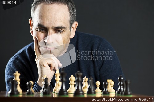 Image of Man at chess board