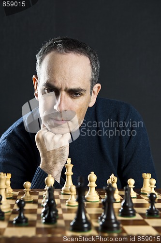 Image of Man at chess board