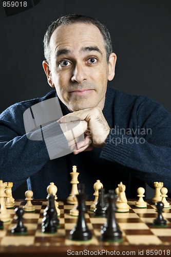 Image of Man at chess board