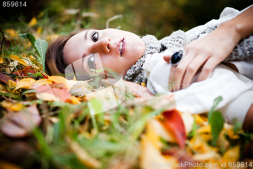 Image of Beautiful autumn woman