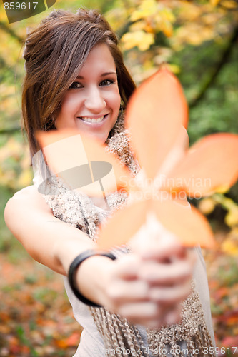 Image of Beautiful autumn woman