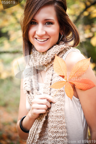 Image of Beautiful autumn woman
