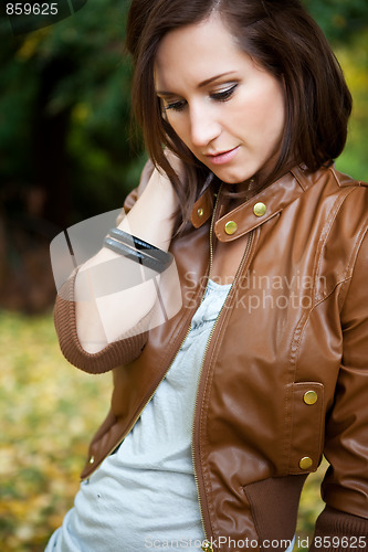 Image of Beautiful autumn woman