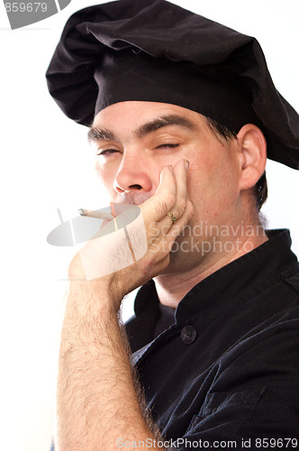 Image of male chef in black smoking