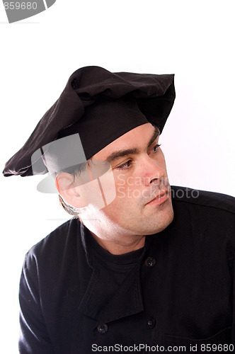 Image of portrait of male chef in black