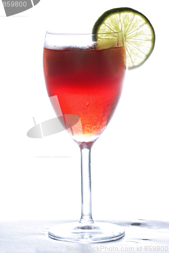 Image of Red cocktail in counter light