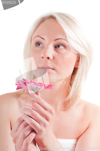 Image of Beautiful woman with gerbera