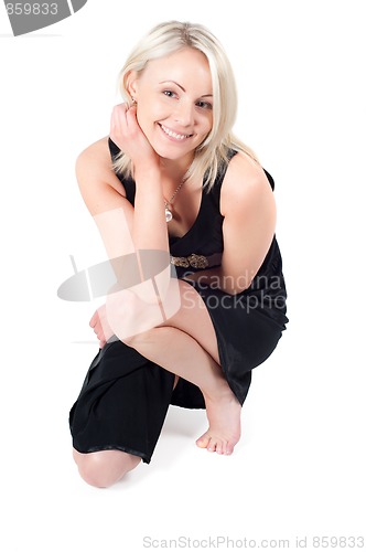 Image of Beautiful woman in black dress