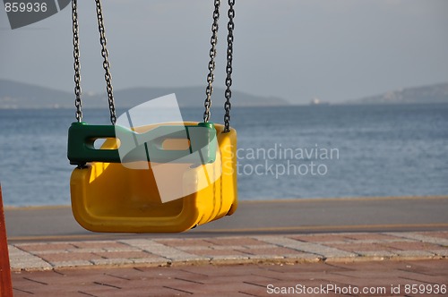 Image of swing by the seaside