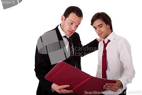 Image of two businessmen talking about work