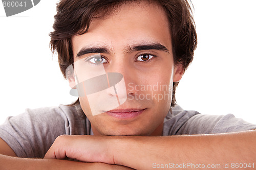 Image of Portrait of a handsome young man thinking