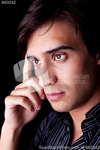 Image of Portrait of a handsome young man thinking