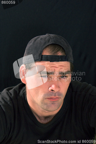 Image of tough guy with furrowed brow