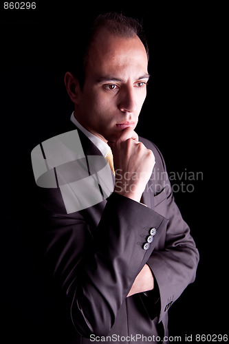 Image of Young Business Man thinking