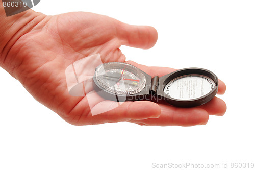 Image of A compass in hand