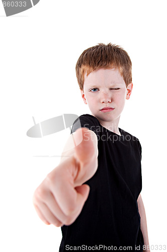 Image of Portrait of a cute young boy, with thumb up