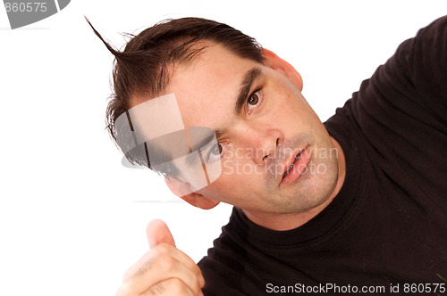 Image of man with point of jair on head