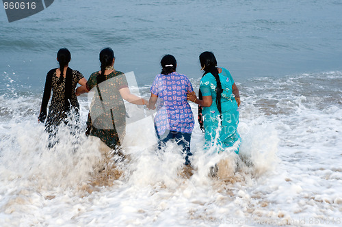 Image of family having fun at a local beach