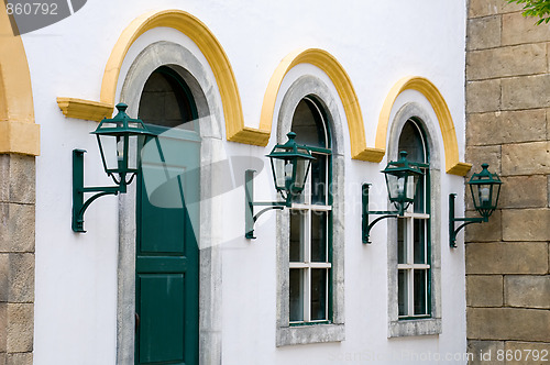 Image of Facade of windows and antique lanterns
