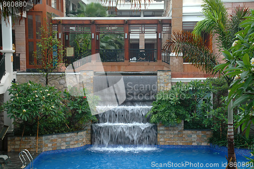 Image of Pool and waterfall in hotel