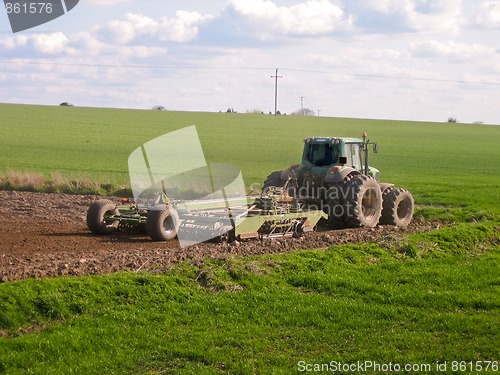 Image of Tractor ploughing field