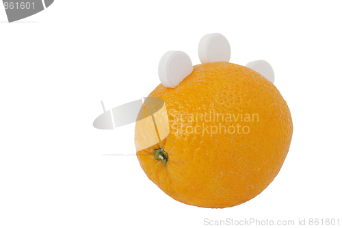 Image of Orange with vitamin C tablets