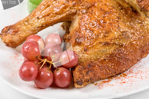 Image of Half roasted chicken closeup