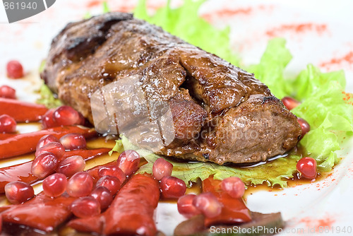 Image of beef steak with pomegranate