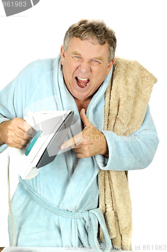 Image of Man Burns Finger On Iron