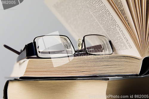 Image of books and eyeglasses