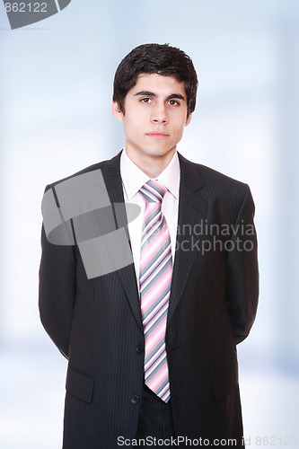 Image of young business man standing