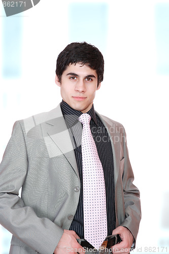 Image of young business man standing