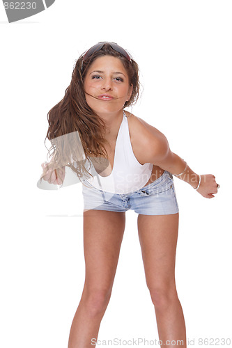 Image of young woman in jeans shorts