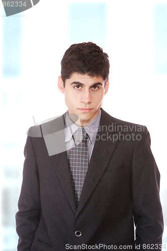 Image of young business man standing