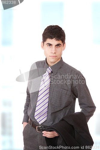 Image of young business man standing