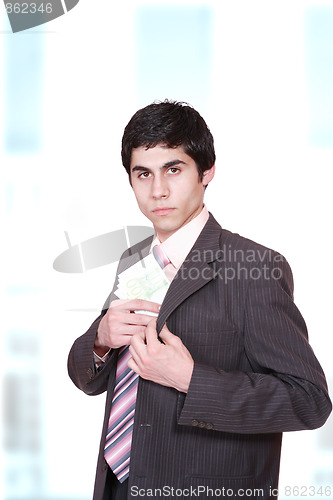 Image of young business man standing